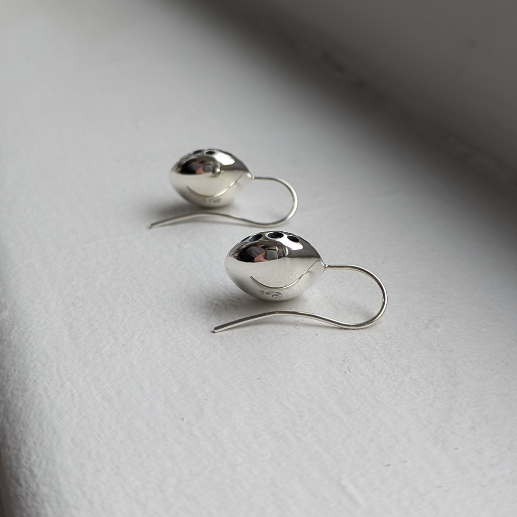 round domed holey earrings