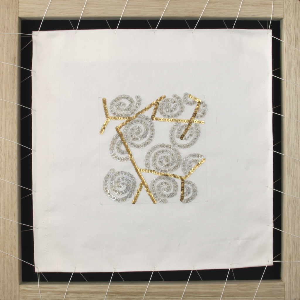Sample (Armani)
2022
Repurposed domestic plastic, found cushion cover, glass beads, thread