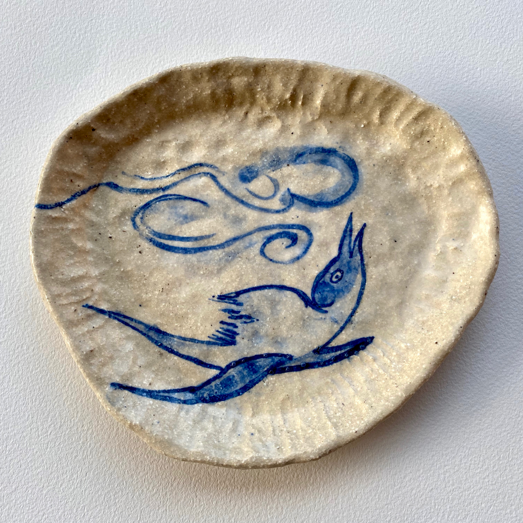 side plate with chirpy bird and clouds (2023)
155 x 180 x 20mm
stoneware, cobalt decoration,glaze
photo: Gus Clutterbuck